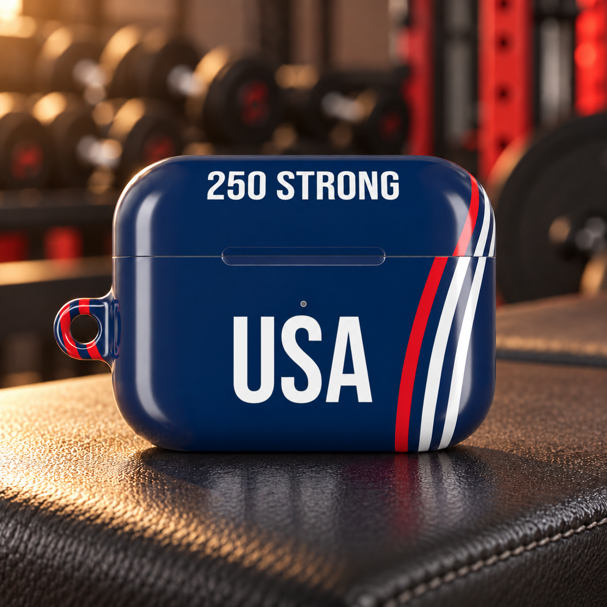 250 Strong Navy AirPods Pro Gen 2 protective case on a gym bench; body-centered design